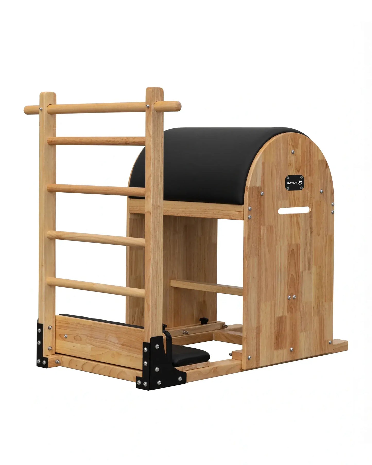 Gym Gear Pilates ladder barrel with padded surface and wooden frame, used for flexibility and core strength exercises.