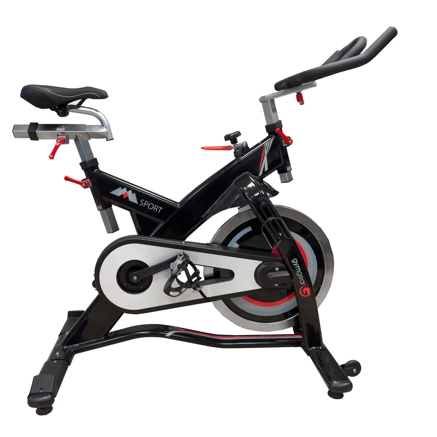 M Sport indoor studio exercise bike with adjustable seat and handlebars, designed for indoor cycling workouts.