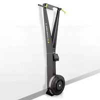 Concept2 SkiErg cross-country ski trainer with handles and footrests, used for cardio workouts and endurance training.