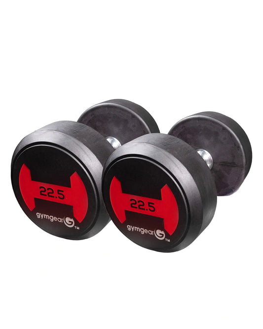 Pair of Gym Gear rubber dumbbells with 22.5kg weight and red end caps, suitable for strength training and fitness workouts.