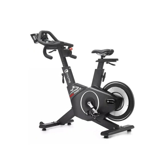 M Sport Elite exercise bike with adjustable seat and handlebars, digital display, and sturdy frame for home fitness workouts.