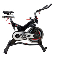 M Sport indoor studio exercise bike with adjustable seat and handlebars, designed for indoor cycling workouts.