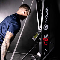Gym Gear Ski Max 2.0 cardio machine, featuring handles and foot pedals, designed for full-body aerobic workouts.