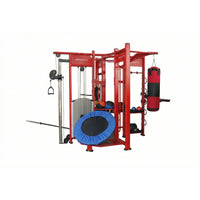 Red Spartan Studio Rig multi-functional fitness station with blue trampoline punching bag and various exercise equipment