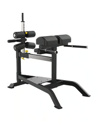 Sterling Series Glute Ham Bench by Gym Gear, a plate-loaded exercise bench for glute and hamstring workouts.