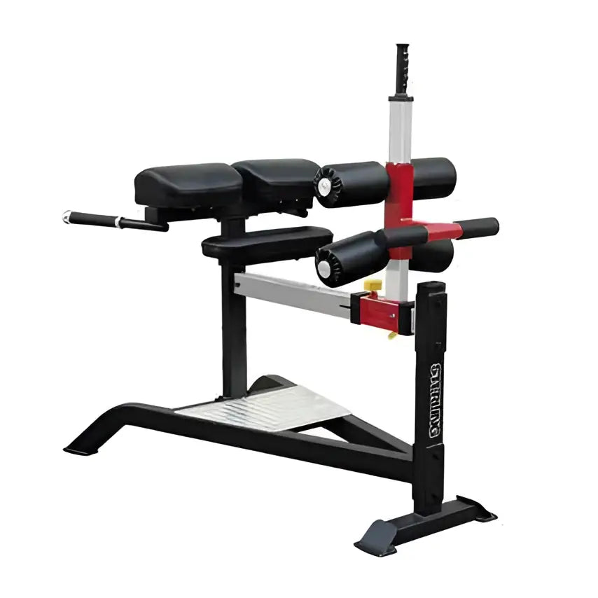 Plate loaded Gym Gear Sterling Series Glute Ham Bench for glute and hamstring workouts, with padded support and adjustable positioning.