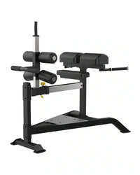 Sterling Series Glute Ham Bench by Gym Gear, a plate-loaded workout bench for glute and hamstring exercises.
